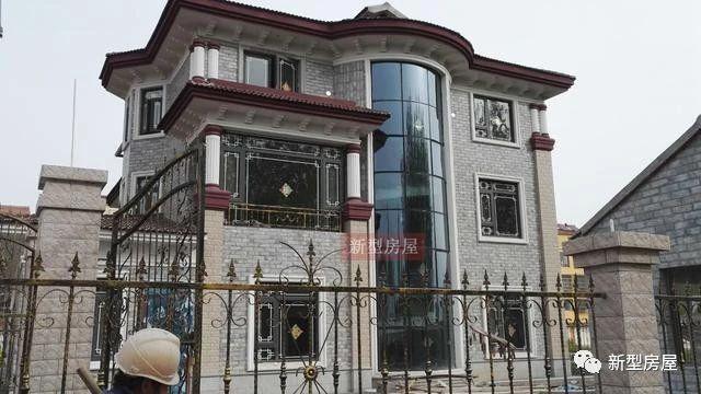 幾棟完工的農(nóng)村房屋實拍照片，一棟賽一棟的漂亮