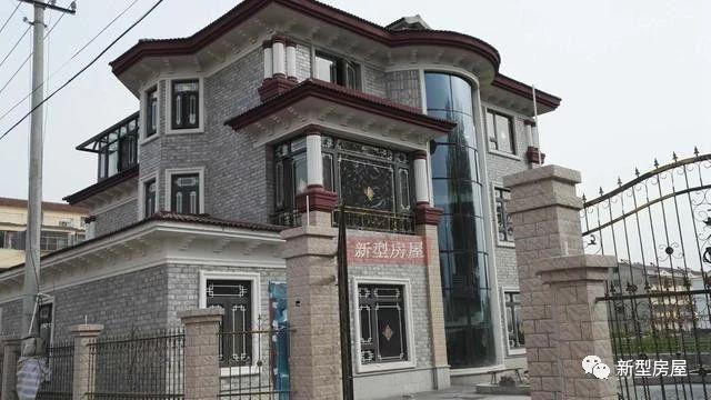 幾棟完工的農(nóng)村房屋實拍照片，一棟賽一棟的漂亮