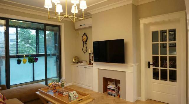 98平新房簡美風格裝修完成，尤其是電視墻造型，做成了一個假壁爐，超美！
